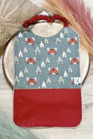 Bavoir maternelle ocre à motifs de renards